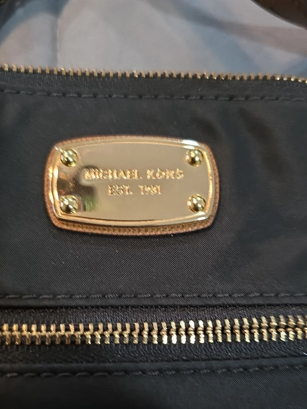 Michael Kors Black Crossbody Bag with Tan Trim and Gold Hardware